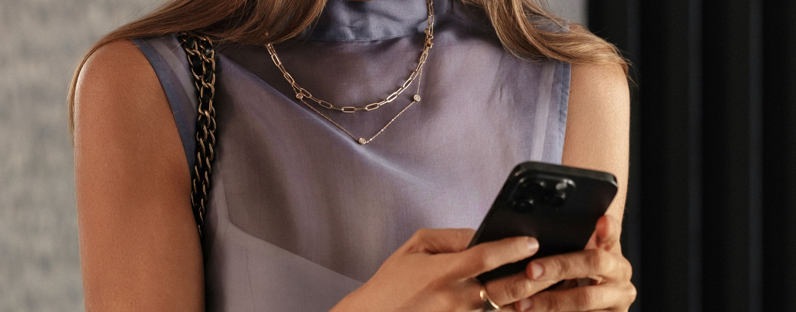 An image of a trend-setter using her phone and social media.