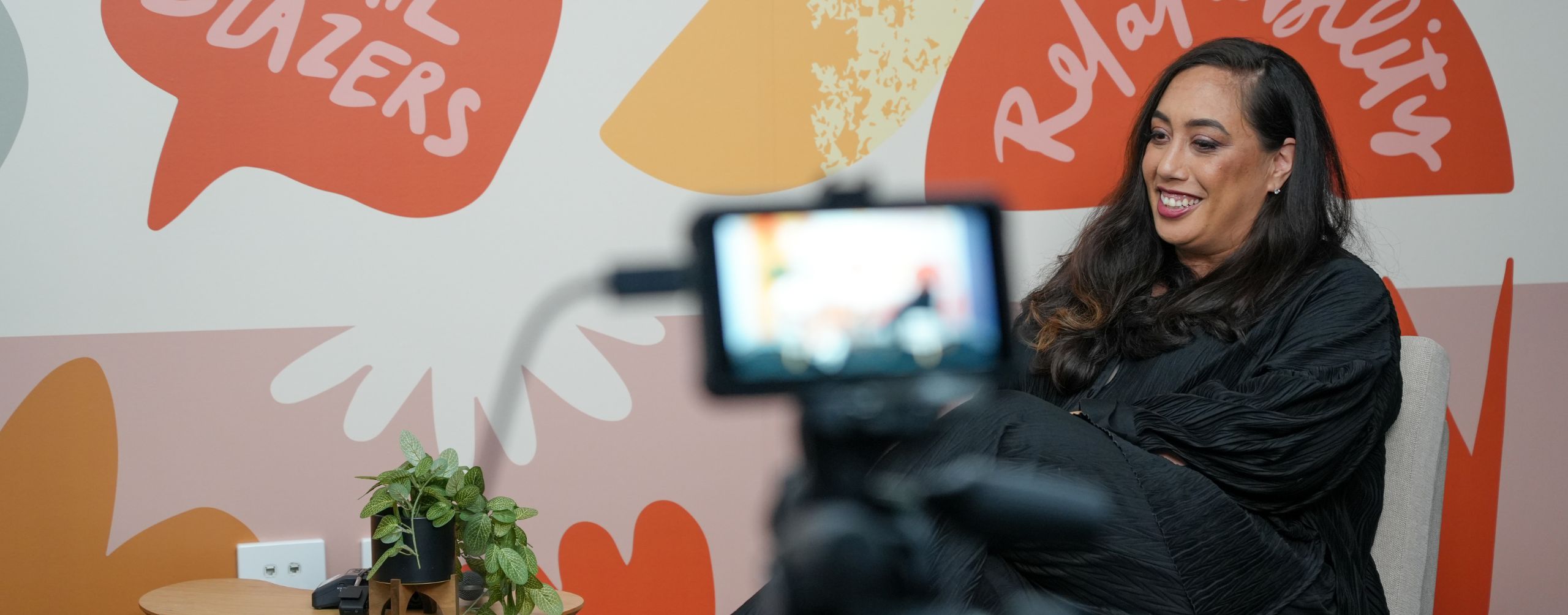 Comradery Collectives Managing Director, Riria Taukamo shooting a podcast series.